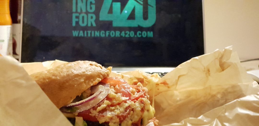 Food from Burgery Weganskie with Waiting for 420 logo in the background